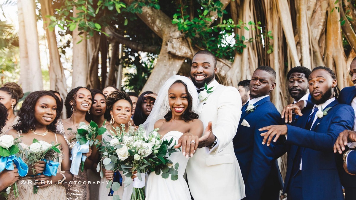 Wedding party at the Banyan tree. Photo by Reem Photography.